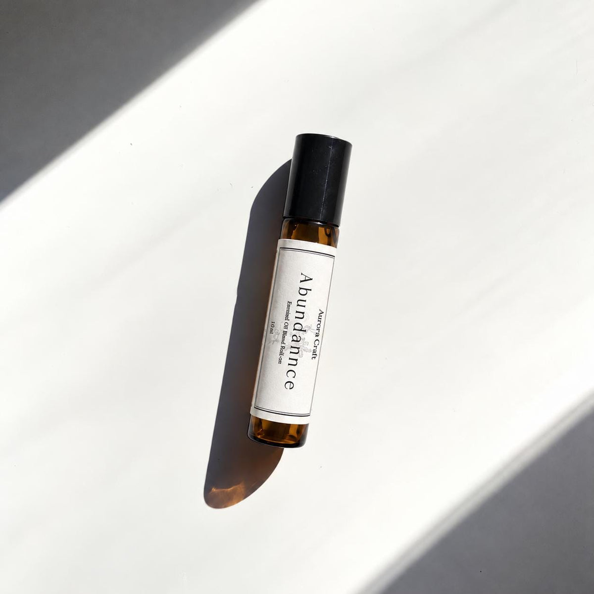 Aurora Craft Abundance essential oil roll-on, 10 ml, white label
